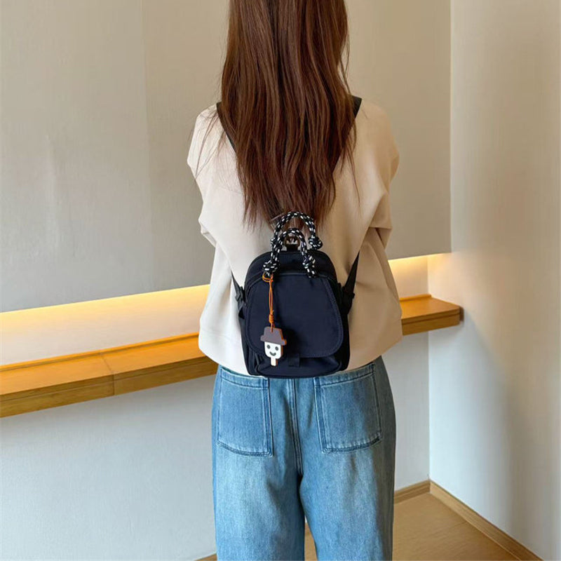 Convertible Mini Backpack – Handheld, Crossbody & Backpack