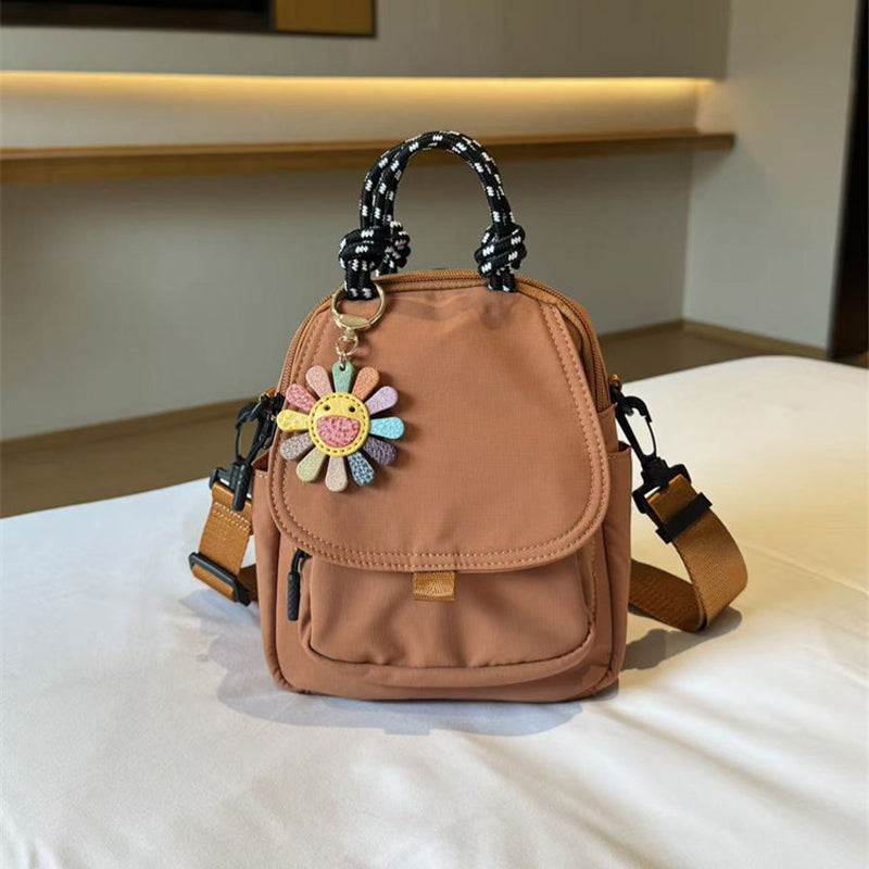 Convertible Mini Backpack – Handheld, Crossbody & Backpack