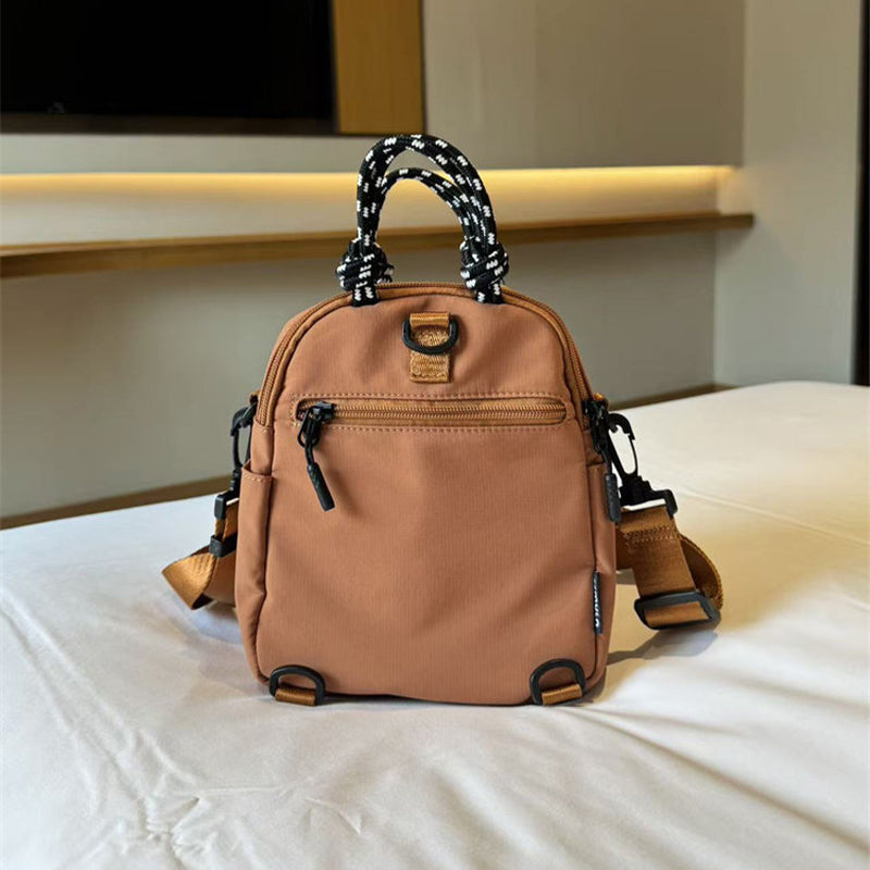 Convertible Mini Backpack – Handheld, Crossbody & Backpack